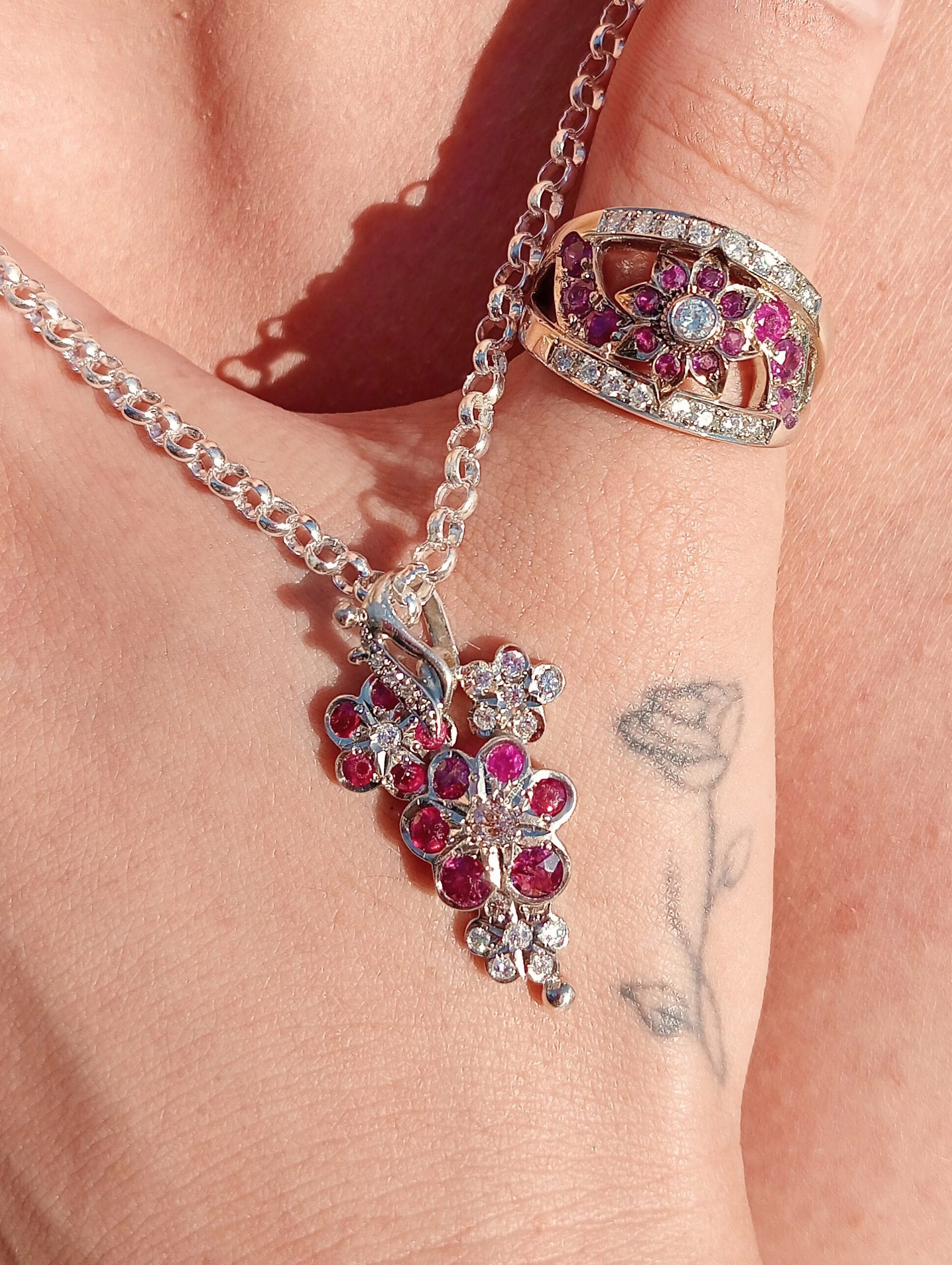 remodelled ruby and diamond ring and pendant in white gold