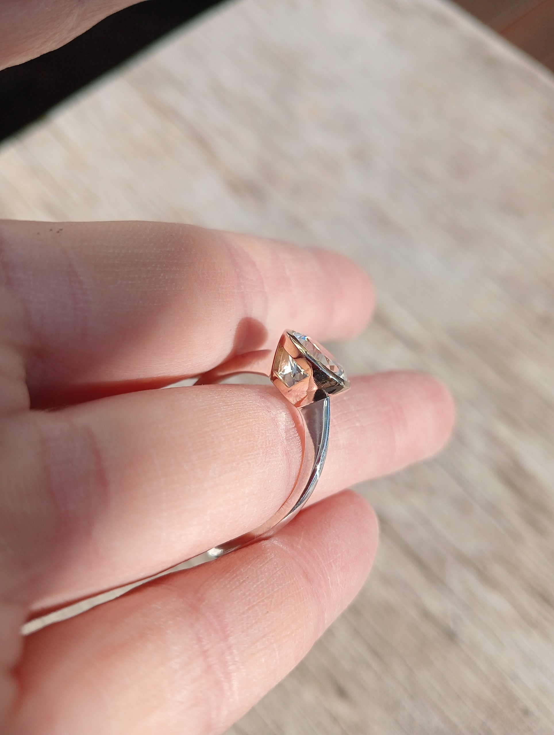 remodel of a highset 70's solitaire ring into a highset bezel set ring