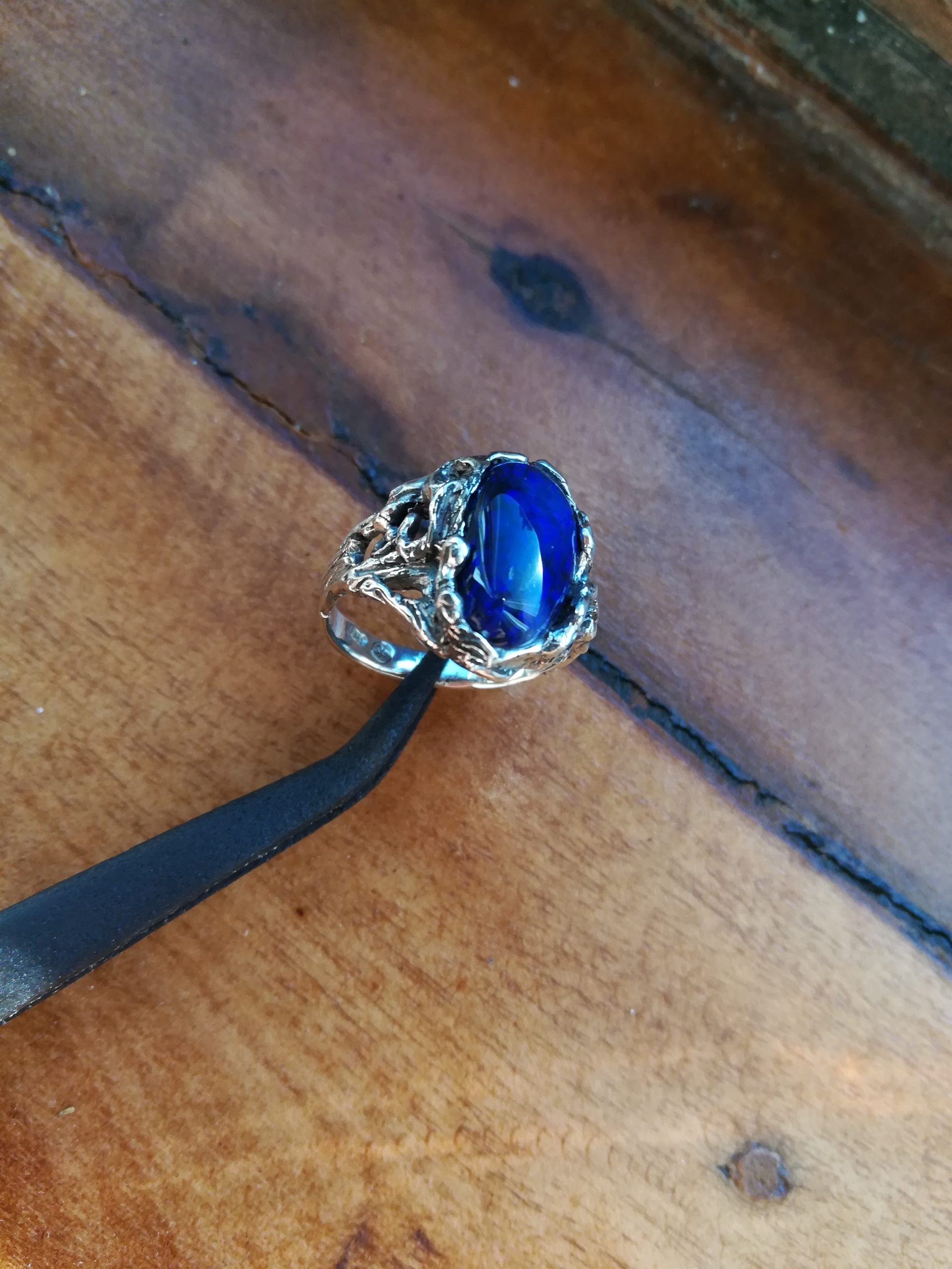lapis in a viney setting