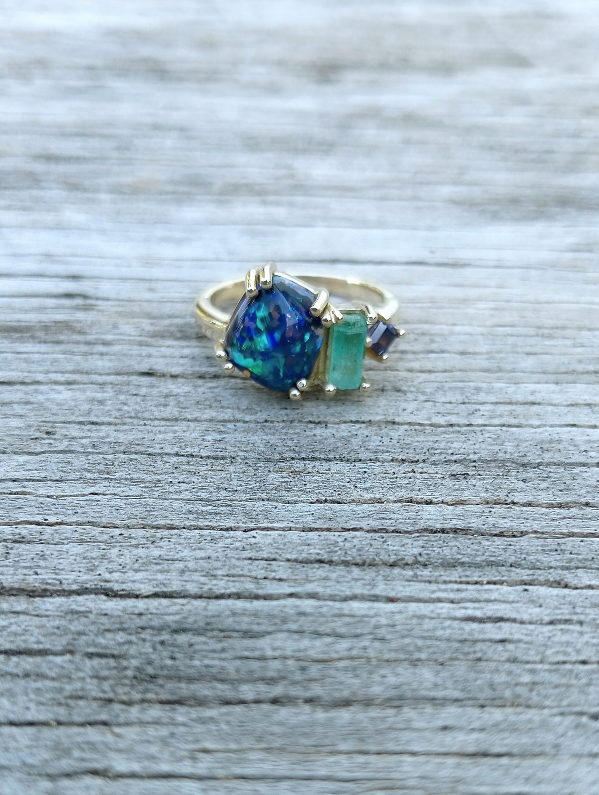 opal, emerald and purple sapphire ring